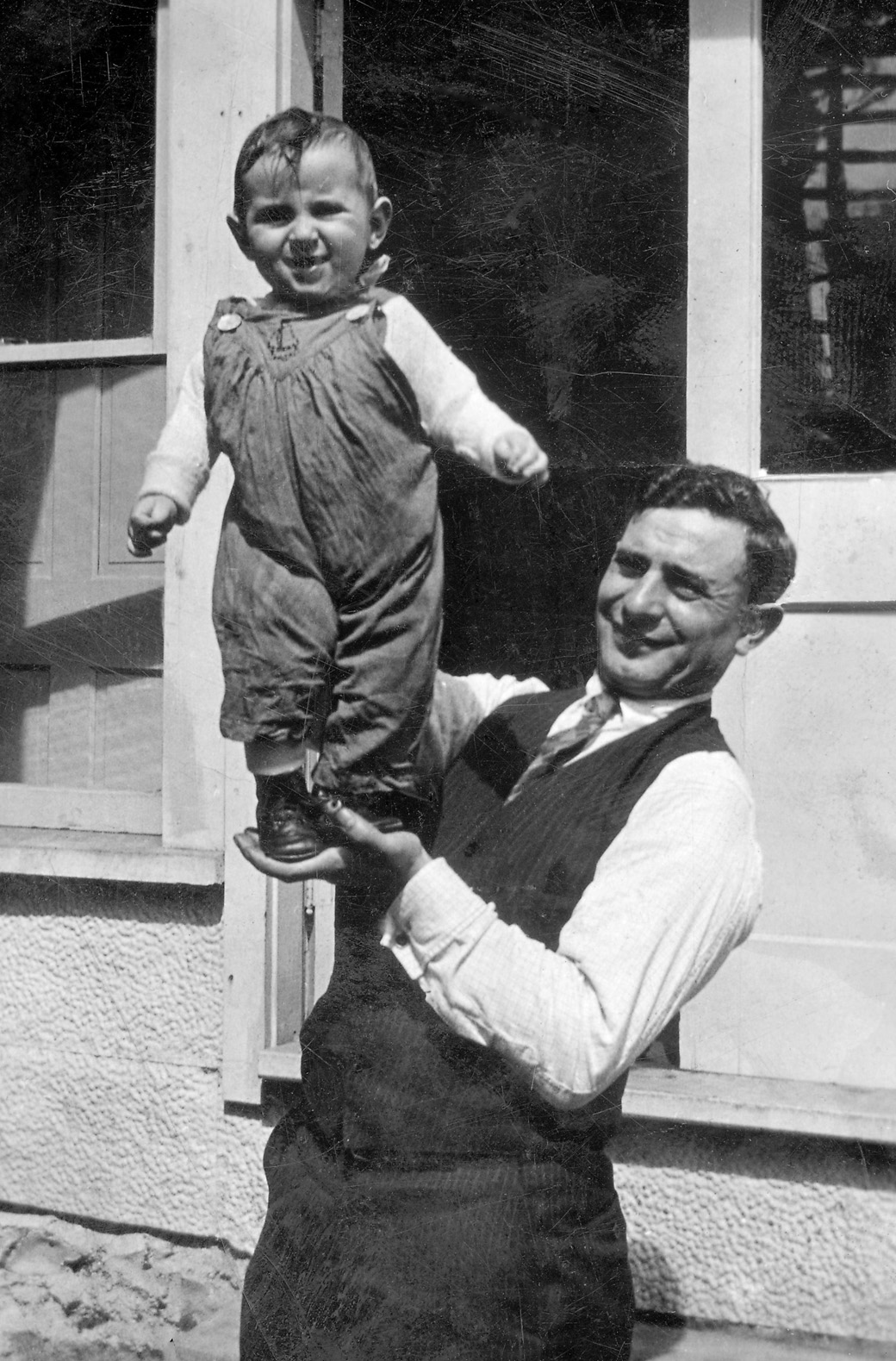 man and baby boy possibly Lyle Nelson